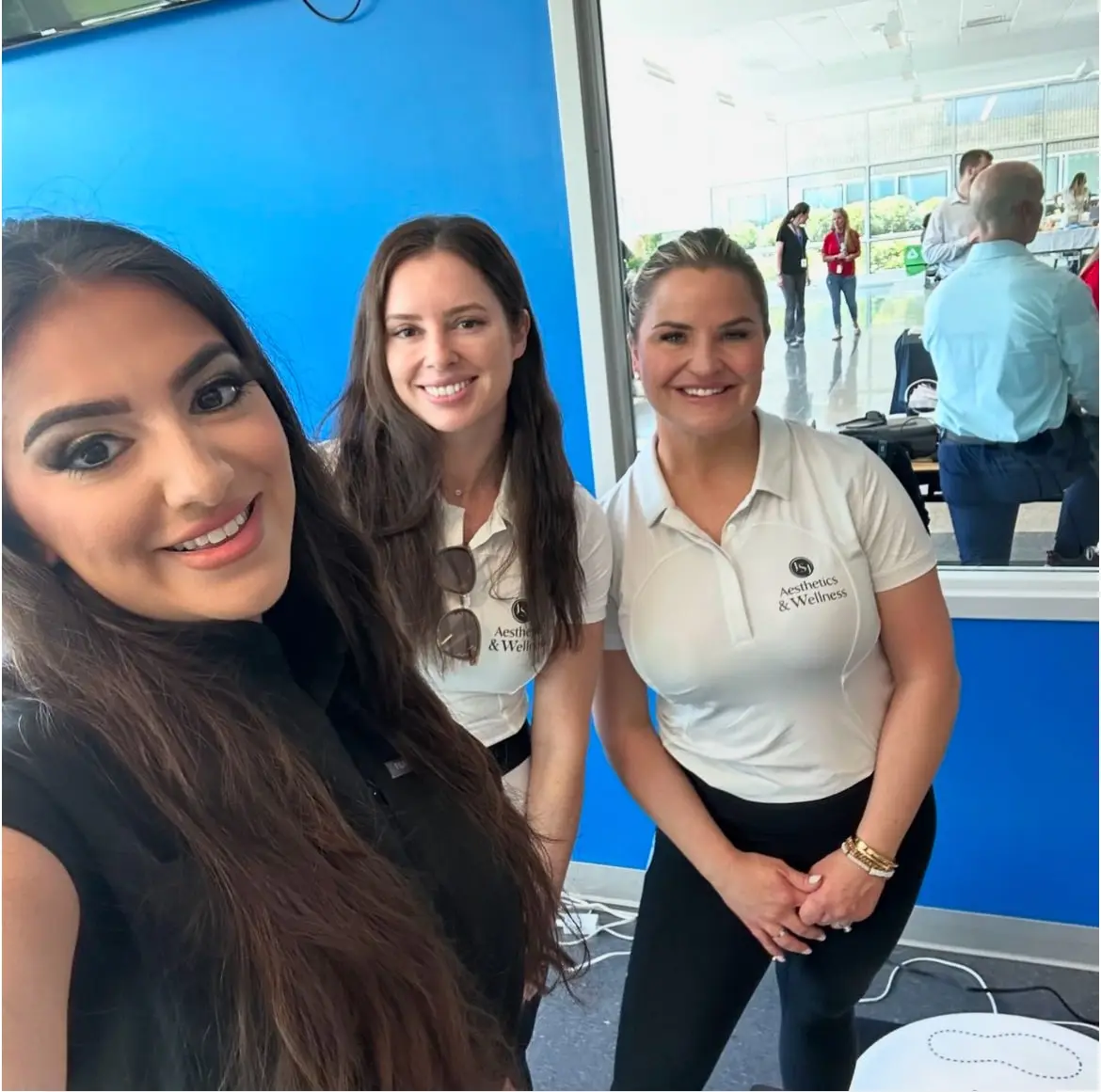 a group of women posing for a selfie