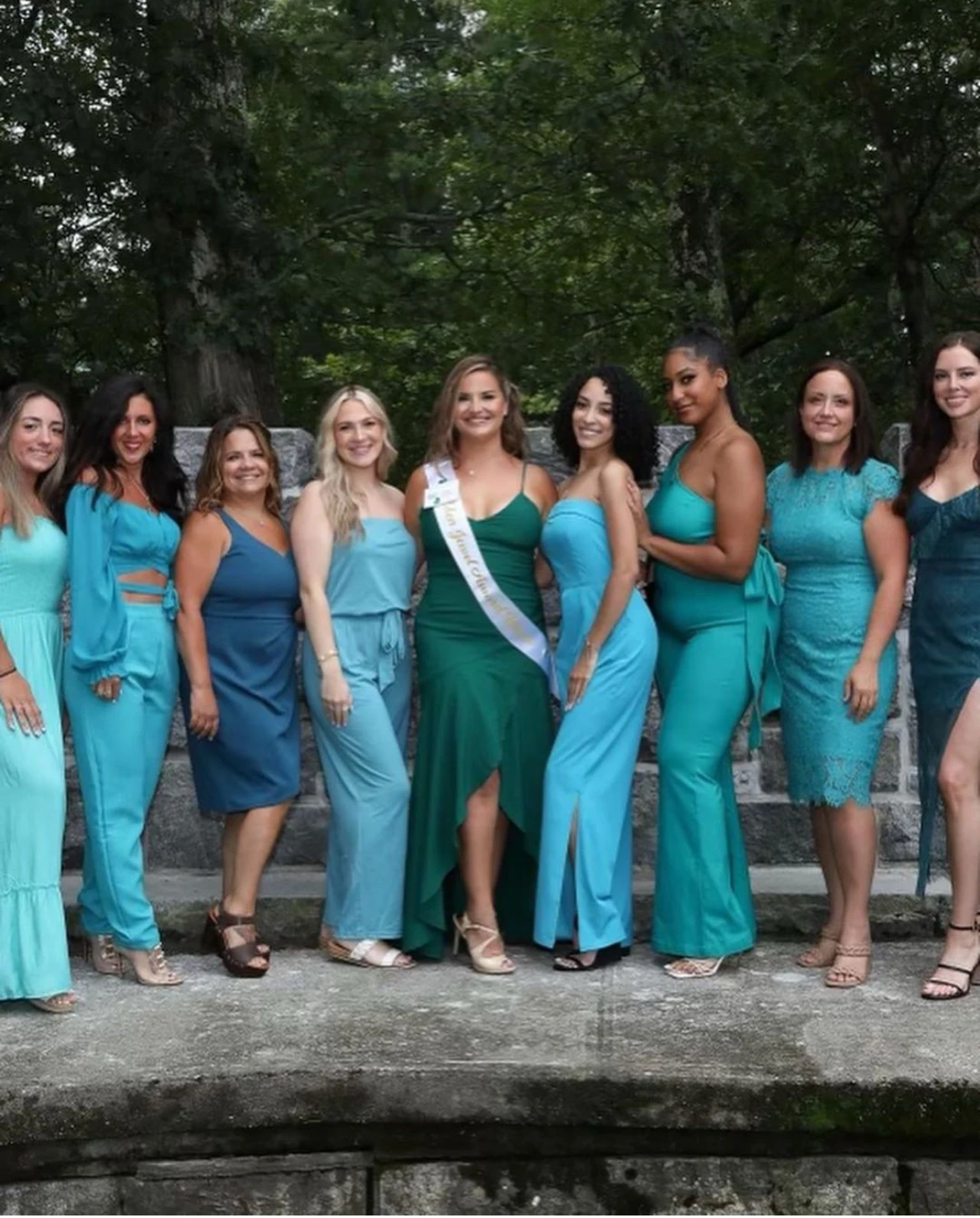 a group of women posing for a photo