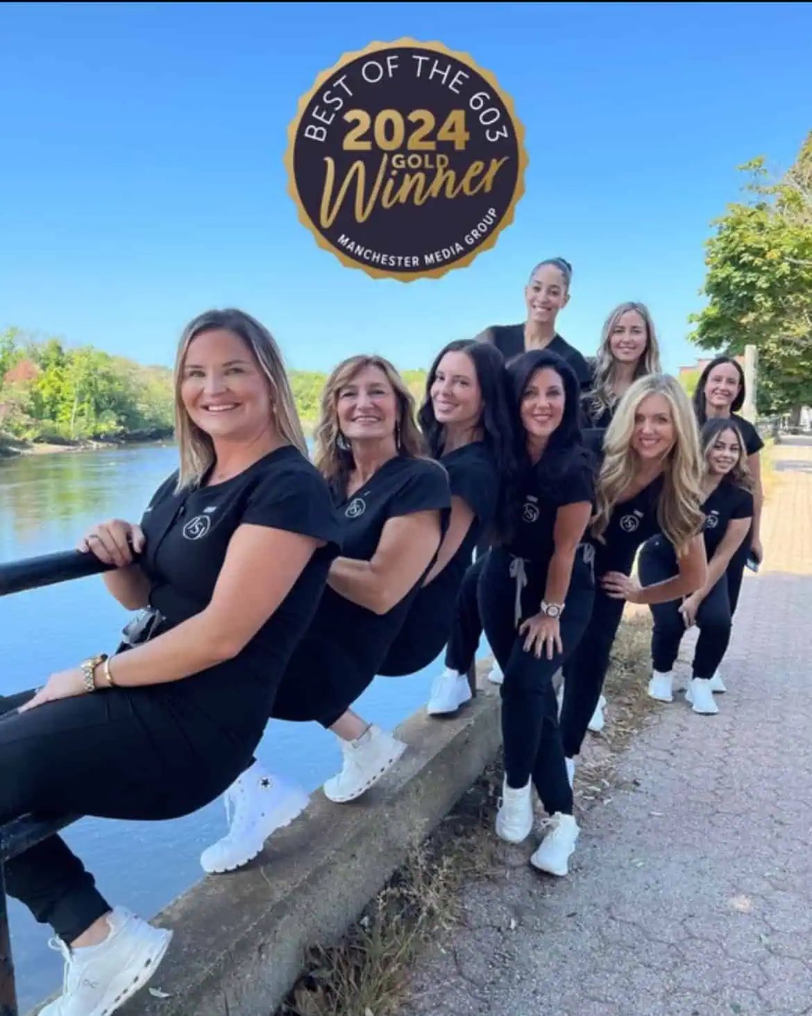 a group of women posing for a picture