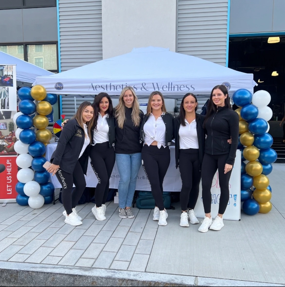 a group of women posing for a photo