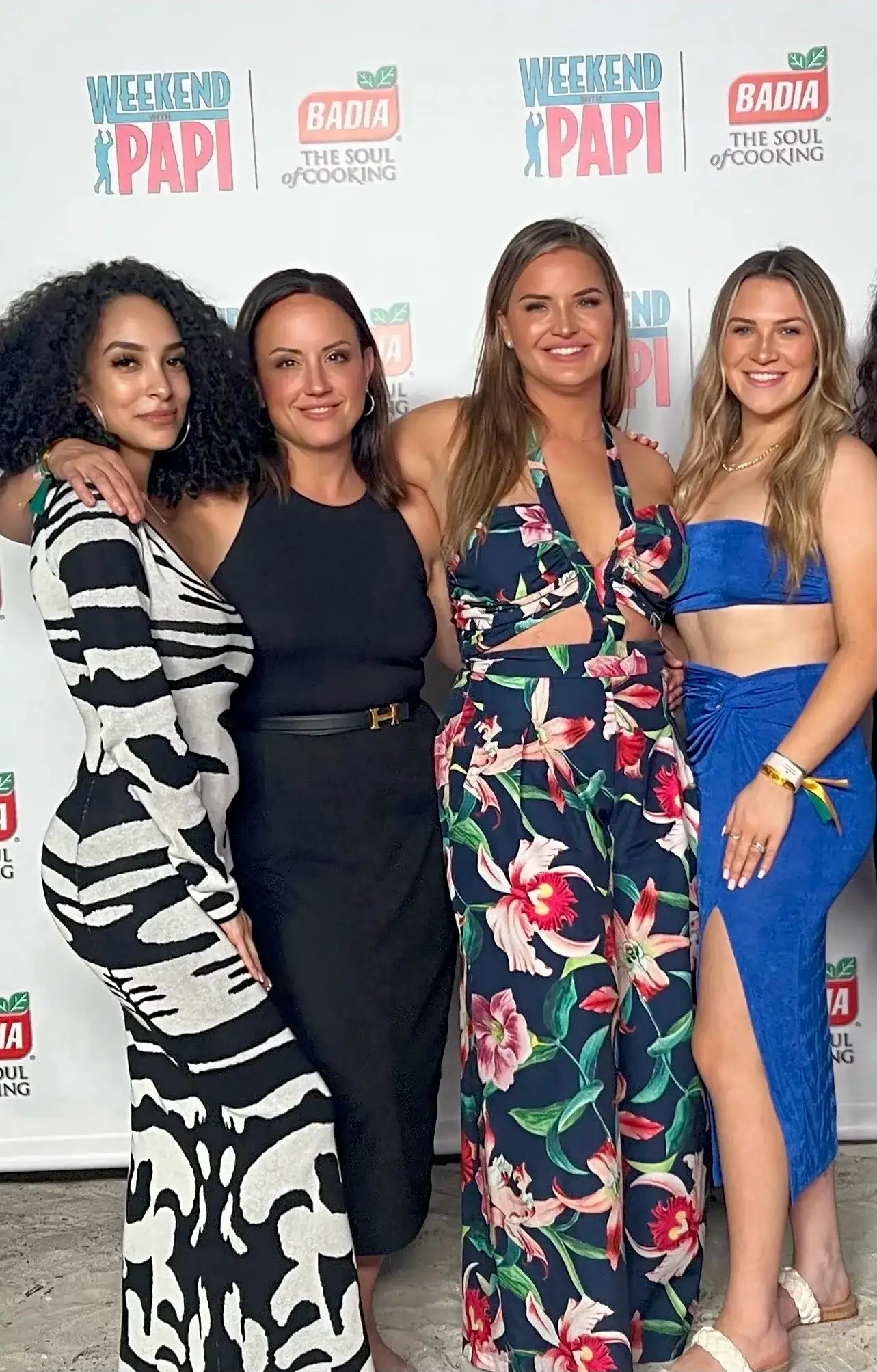 a group of women posing for a photo