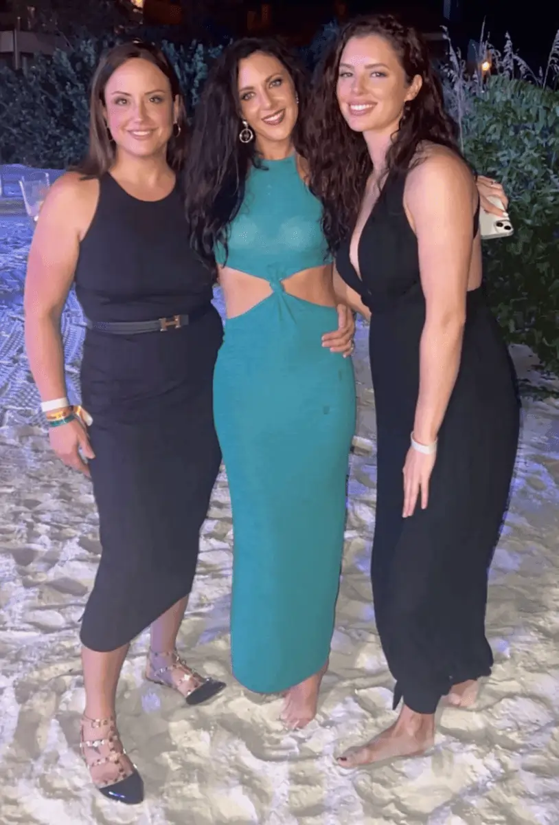 a group of women posing for a picture