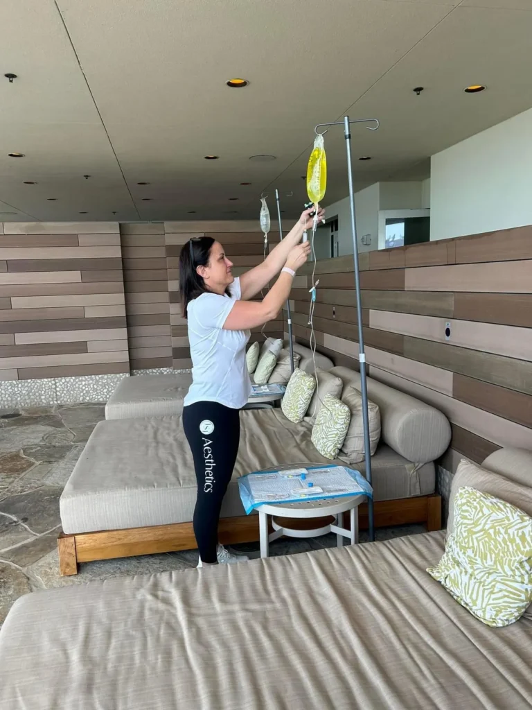 a woman holding a dropper